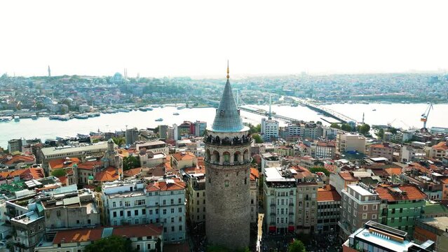 Cinematic Establishing Drone Video of the Galata Tower in Beyoglu District In Istanbul, Turkey.