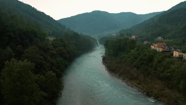 Isonzo Soča river with iconic emerald and blue water in the alps in Slovenia and Italy.
