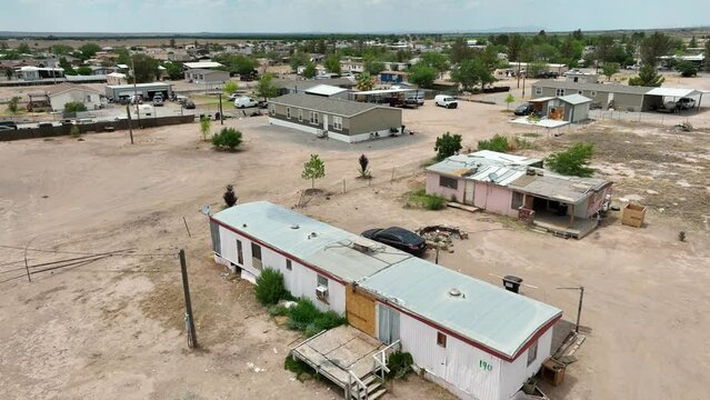 Mobile home in desert area. Aerial shot of trailer park for low income. Southwest USA housing theme.
