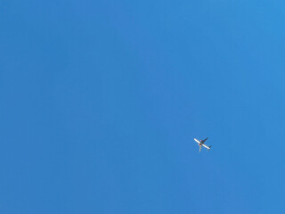Blue sky with airplane as background