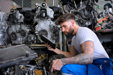 Mechanic work at auto repair shop.