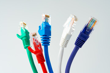 Colorful network cables switch on white background