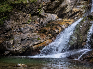 Fototapeta premium Waterfall in the Maria Valley ( Valea Mariii ) gorge, Hunedoara county, Romania