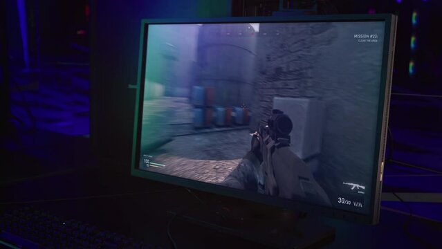 Streaming the newest single player first-person shooter combat video game. Streamer attempting to complete a challenging mission in a video game. Streamer killing npcs in the war video game.