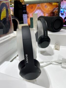 WH-H910N h.ear on 3 Wireless Noise Cancelling Headphones. Close-up view new h.ear range. Table of showroom, exhibition. New model for sale. Product of Sony Corporation. Famous Japanese manufacturer.
