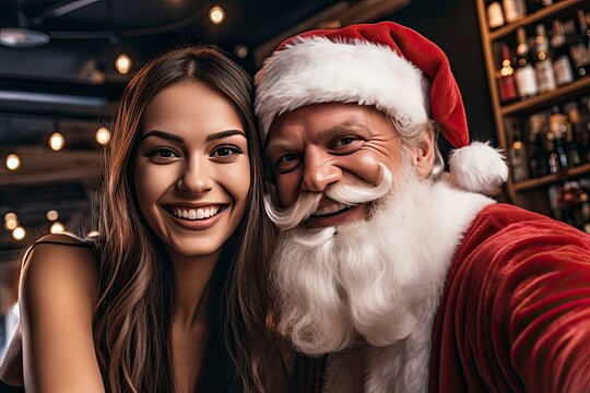 Santa Claus and Young Woman Taking a Selfie Together.
