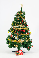 Beautiful Christmas tree decorations everything from twinkling lights isolated on a white background