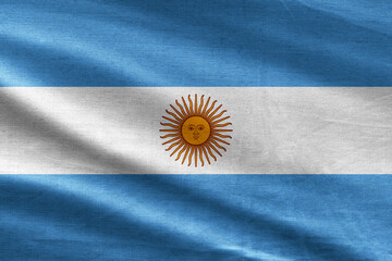 Argentine flag waving in the wind. Close up of Argentina banner blowing, soft and smooth silk. Cloth fabric texture ensign background. Use it for national day and country occasions concept.