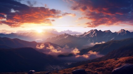 the sun is setting over a mountain range