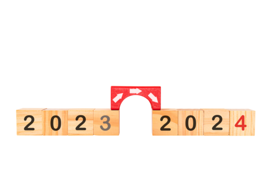 Transition years 2023 to 2024 on wooden blocks with copy space. To prepare for the new year changes and start thinking about strategies and new business goals.PNG