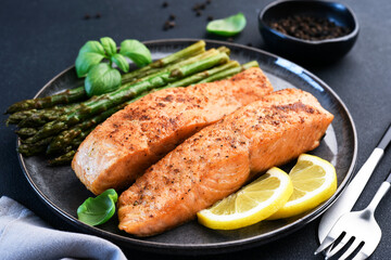 Baked salmon with asparagus for dinner