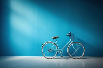 Blue bicycle with a basket in an empty room near a blue wall. Generated by artificial intelligence