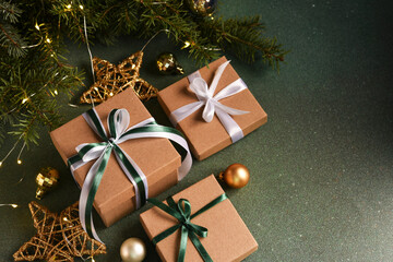 Christmas Green Background.Christmas boxes with gifts and Christmas decoration - 679045213