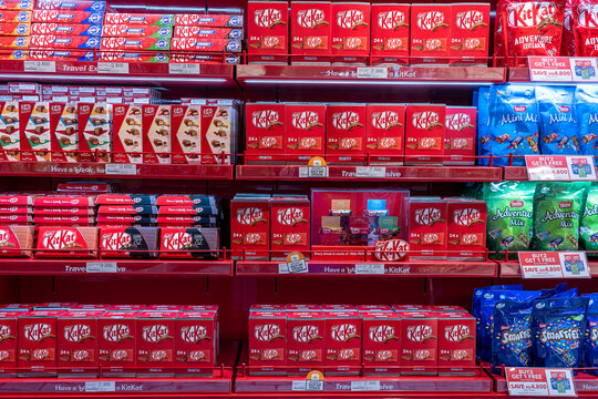 Kit Kat chocolates and other sweets on a shelf at the duty-free shop at the Muscat international airport, Oman