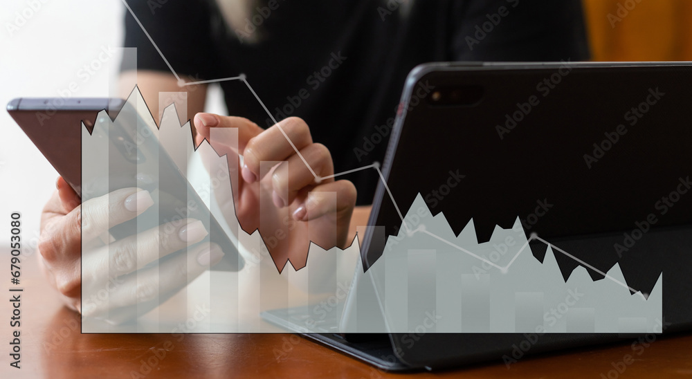 Aufkleber people using tablets and using tablet with a business graph showing up in a virtual screen. new star