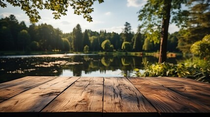 The empty wooden table top with a blurred background of summer lakes green forest