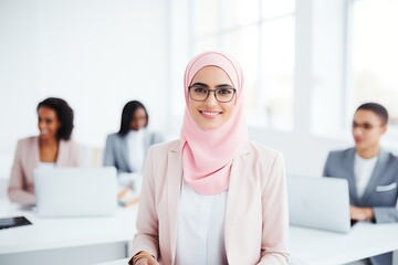 Confident woman in hijab with a professional team in the background