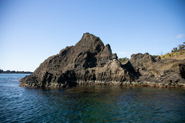 Fototapeta na wymiar Coastline formed by volcanic activity in Ogi coast in Sado Island, Niigata prefecture, Japan.