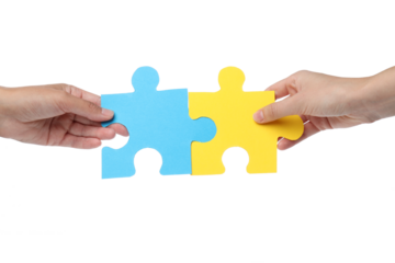 PNG, Blue and yellow puzzles in hands, isolated on white background