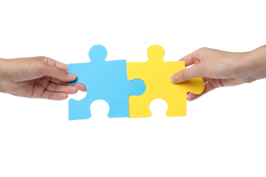 PNG, Blue and yellow puzzles in hands, isolated on white background