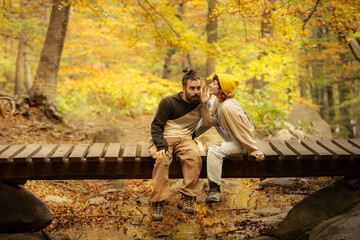 Fototapeta premium couple of man and woman talking, hugging, looking at each other,