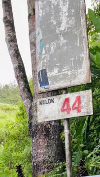 sign in the forest, kelok 44, maninjau, sumatera barat, padang, indonesia