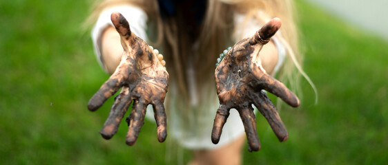 close-up of dirty muddy woman's palms