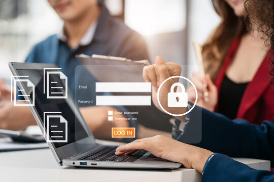 Businessman typing login and password in the concept of cyber security, information security, data protection, and encryption for secure access to user's personal information.