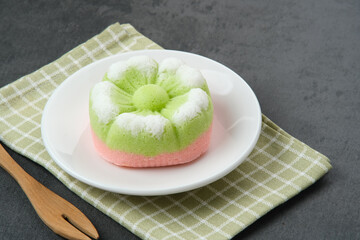 Kue Putu Ayu, a traditional Indonesian snack made from rice flour, suji leaves, pandan leaves, grated coconut then steamed, sweet and savory. 
