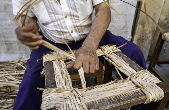 Man working with wicker