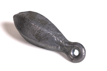 Lead fishing weights cast sinkers isolated on white background. Equipment or tools. Heap of lead sinker weights for fishing, silver bullet bank accessories, close up