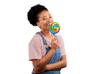 Portrait, smile and a black woman with a sugar lollipop isolated on a transparent background. Candy, rainbow and sweets with a happy young african person eating or licking a colorful snack on PNG