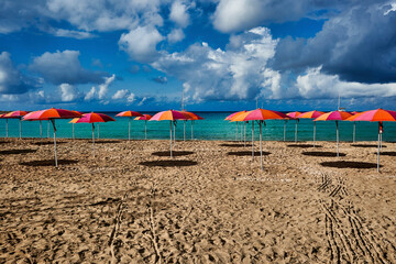 beach umbrellas on beach - 679084067
