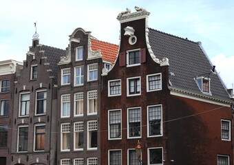 Fototapeta na wymiar Amsterdam Herengracht Canal Brick House Facades Close Up, Netherlands