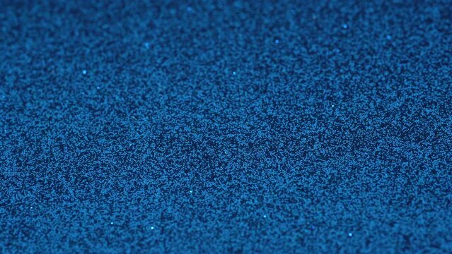 New year decorative blue gift paper with blinking points turning slowly around. High quality 4k footage