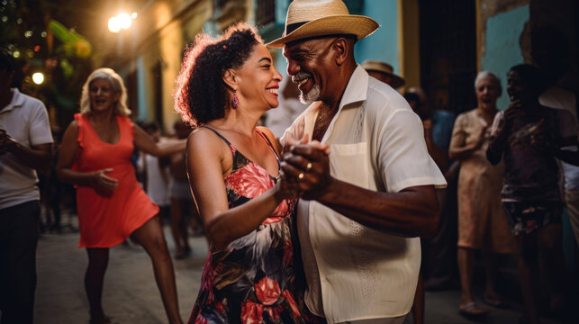 Fototapeta Cuban couple dance a romantic traditional salsa in a Cuban street