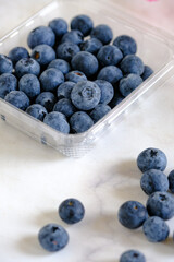 group of organic blueberry in basket