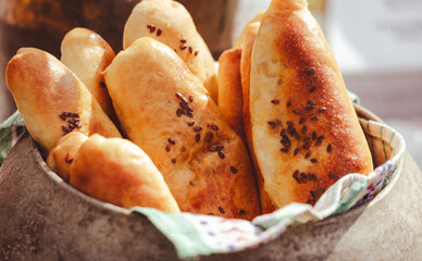 Baked dough buns as a background. Close-up