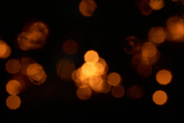 Beautiful red bokeh between black shadows.