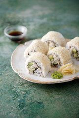 Homemade sushi rolls with crab meat and avocado