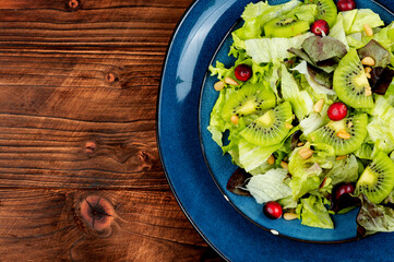 Healthy salad of kiwi, copy space