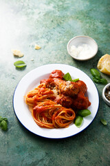 Spaghetti with meatballs and Parmesan cheese