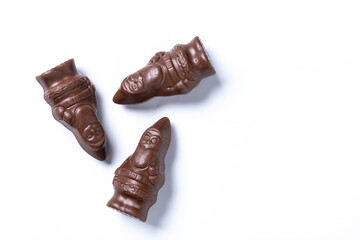 cheerful wrapped chocolate Santa Claus isolated on white background