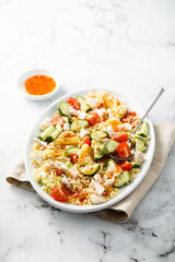 Couscous salad with grilled cheese and vegetables