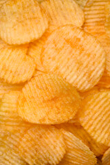 Crispy potato chips with salt, spices and herbs