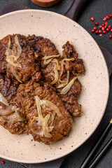Delicious fried chicken or beef liver with salt, spices and herbs