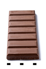 Traditional pieces of delicious Christmas chocolate nougat isolated on white background