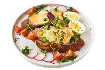 toast with chicken breast, onion and vegetables on a white plate close up