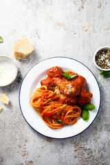 Spaghetti with meatballs and Parmesan cheese