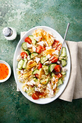 Couscous salad with grilled cheese and vegetables